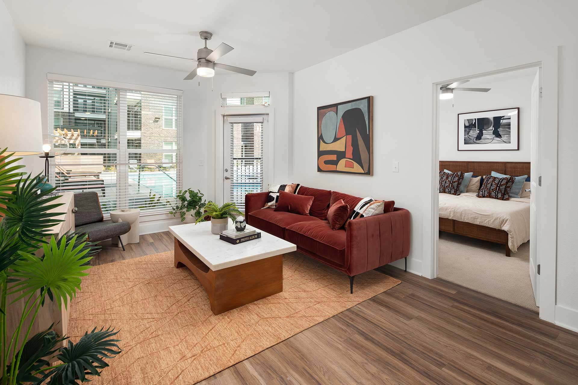 Open and bright living room and kitchen of Rye Charlotte's luxury apartments in Nashville, TN.